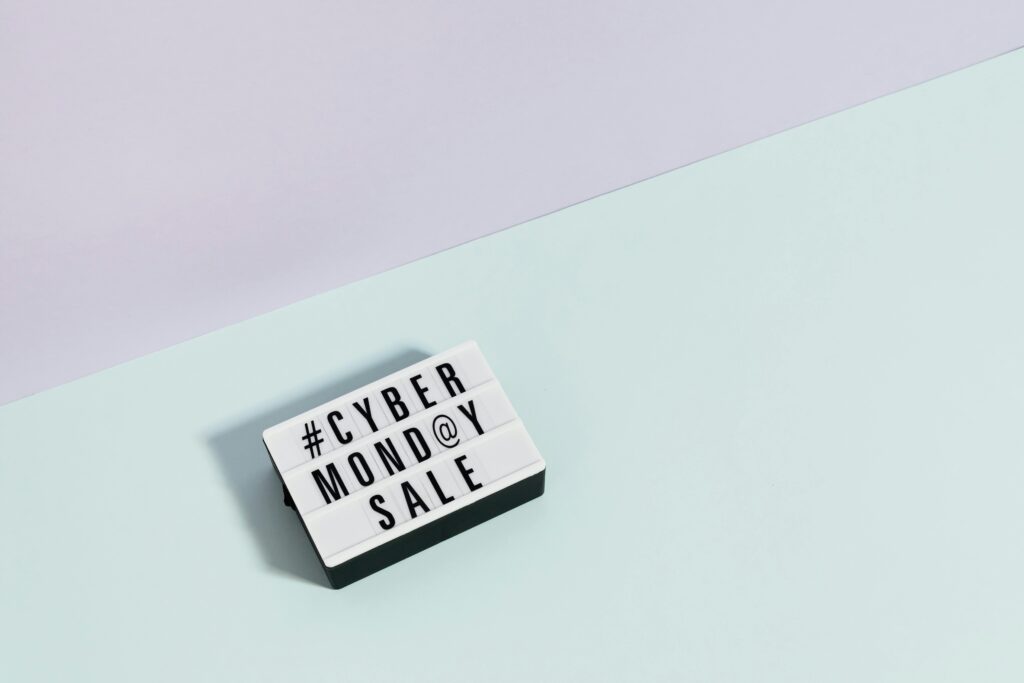 pexels photo 5632362 5632362 Modern minimalist image of Cyber Monday sale sign with pastel background.